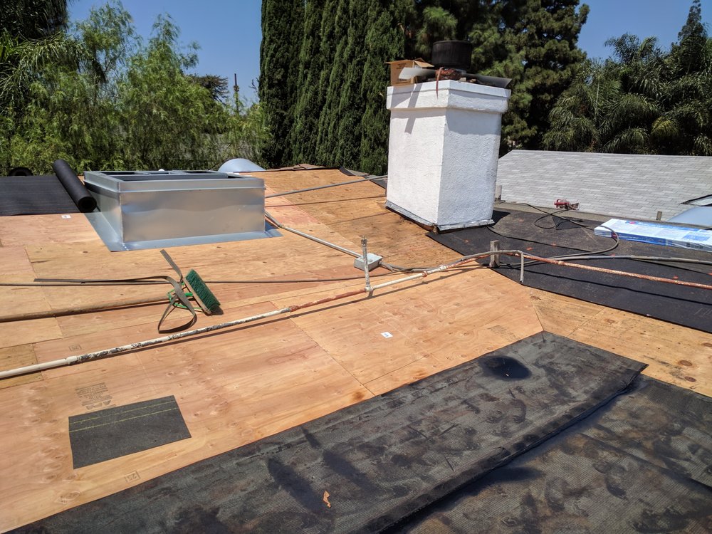 Slide of Delcid Roofing