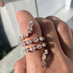 Pear shape Diamond Spiral Ring. Custom made designs!