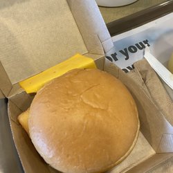 McDonald's - They missed the bun completely. My 1/4 slice of cheese was on the box
