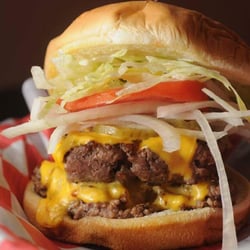 Pender's Cafe - Famous Pender Burger  two 4oz fresh ground beef patties topped your way serverd with crispy fries!