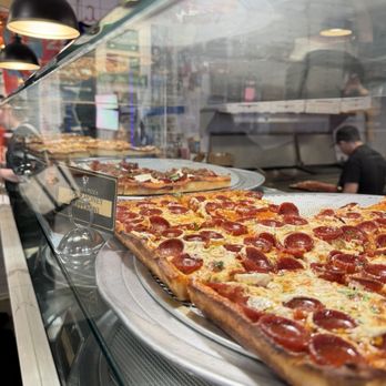 Grandma’s One Pizza - Available pizzas on display - Pizza Near Me - New York, New York