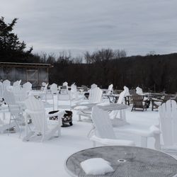 Aquila's Nest Vineyards - Outdoor seating overlooking the hills.