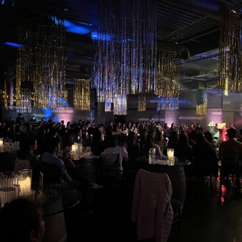 The Bell - a large group of people sitting at tables - Venues & Event Spaces Near Me - Santa Ana, California The Bell - a large group of people sitting at tables - Venues & Event Spaces Near Me - Santa Ana, California