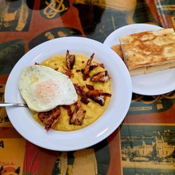Shrimp and cheesy grits with over easy egg & Cuban toast. So good!!