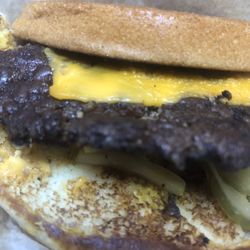 McDonald's - Some kind of cheeseburger with a burnt patty.  Not a quarter pounder.
