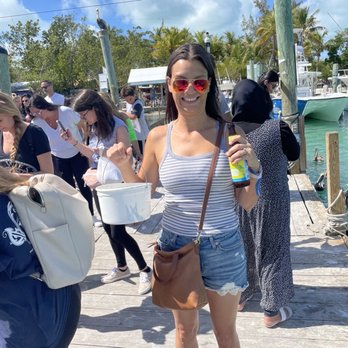 Hungry Tarpon Restaurant - That's a bucket of dead fish for the live fish and my face says it all! Crazy experience! - Seafood Near Me - Islamorada, Florida Hungry Tarpon Restaurant - That's a bucket of dead fish for the live fish and my face says it all! Crazy experience! - Seafood Near Me - Islamorada, Florida