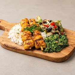 Zaytona Grill - Juicy grilled chicken kabob skewers served with rice pilaf , and choice of 2 sides. E.g. fresh tabbouleh salad, and zaytona salad!