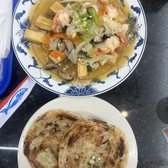 Kampung Malaysian Cuisine - Fried scallion pancake, fried soft tofu - Asian Fusion Near Me - Duluth, Georgia Kampung Malaysian Cuisine - Fried scallion pancake, fried soft tofu - Asian Fusion Near Me - Duluth, Georgia
