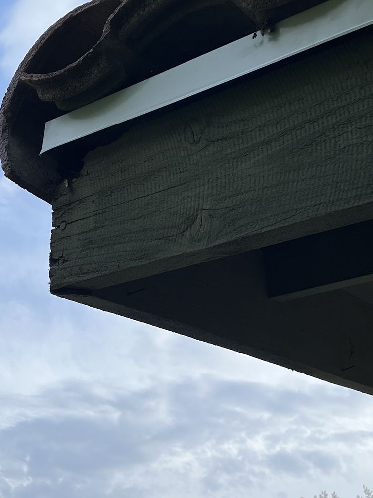 Slide of Titan Roofing