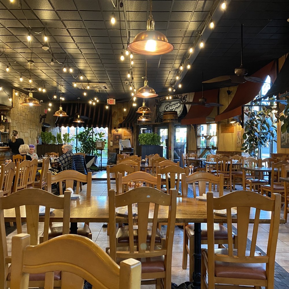tables and chairs in a restaurant tables and chairs in a restaurant