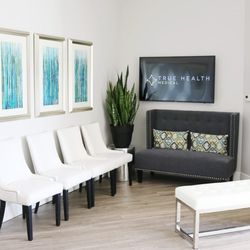 TRUE Health Family Medicine - The waiting area. Make sure to check out our TV's for health tips and news from around the office.