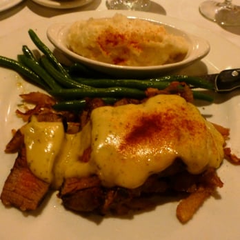 The Derby - Sliced filet served on potatoes and onions and topped with Bearnaise. - Steakhouses Near Me - Arcadia, California The Derby - Sliced filet served on potatoes and onions and topped with Bearnaise. - Steakhouses Near Me - Arcadia, California