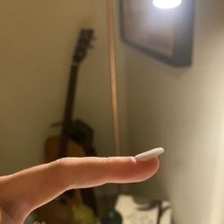 Citris Nail Spa - Left pinky nail is poorly placed and is pointing up.