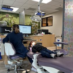 Rancho Kids Dentist  - He's got his cool glasses to protect from the light while he watches Coco