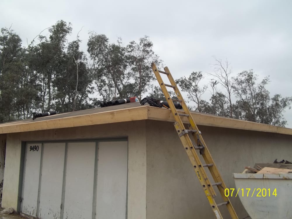 Slide of R Wences Roofing Co