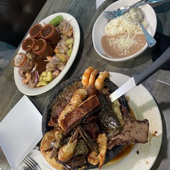 Emporio Sushi Y Mariscos - Molcajete mixto - Bars Near Me - Downey, California Emporio Sushi Y Mariscos - Molcajete mixto - Bars Near Me - Downey, California