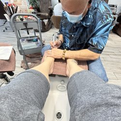 Essential Lash Nail Spa - Paul fixing Gloss nails mess