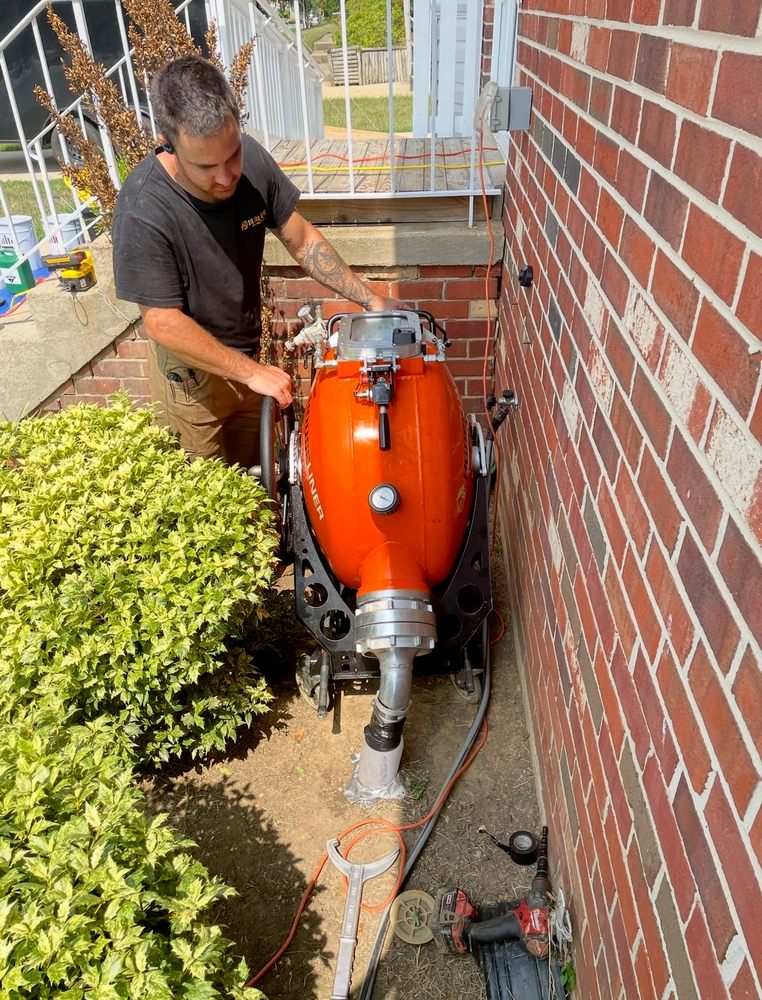 Slide of The Drain Guys