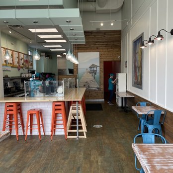 Tropical Smoothie Cafe - Seating area - Juice Bars & Smoothies Near Me - Livonia, Michigan Tropical Smoothie Cafe - Seating area - Juice Bars & Smoothies Near Me - Livonia, Michigan