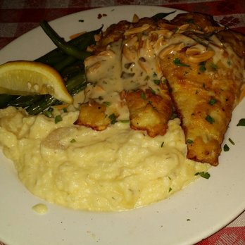 Chez Jay - Tora's Sand Dabs Salmon Dish - salmon was flaky and buttery. Generous portion too! Served with house salad and Green Goddess dressing. - Steakhouses Near Me - Santa Monica, California