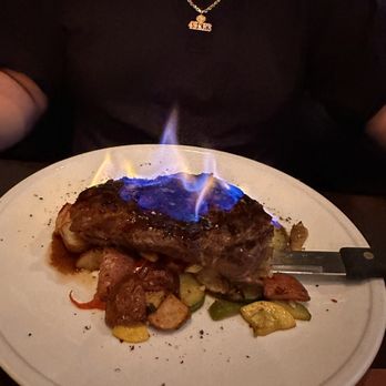 Wildfire Public House - Flaming Ribeye - $45.00 12 oz Ribeye served with roasted potatoes, sauteed mix vegetables, roasted mushroom Cabernet reduction sauce - Breakfast & Brunch Near Me - Modesto, California