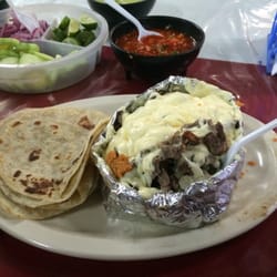 Asadero Las Ranas - Papa loca, baked potato with carne asada and cheese. Served with tortillas.