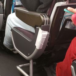 Qantas - Seats held together using tape.