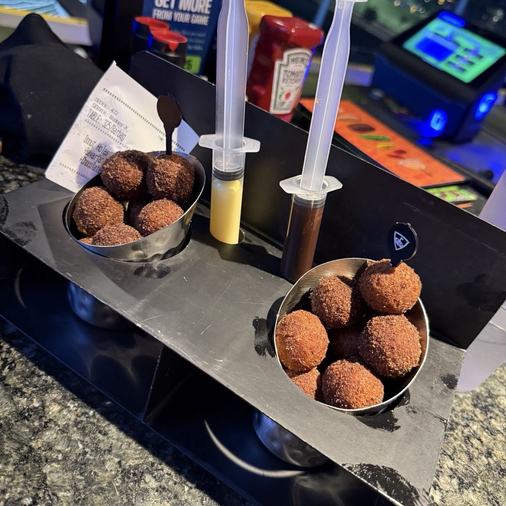 Topgolf - Donut holes with syringes of frosting. Not bad, actually! - Golf Near Me - Montebello, California Topgolf - Donut holes with syringes of frosting. Not bad, actually! - Golf Near Me - Montebello, California