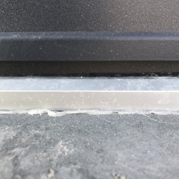Ville Doors - Door leaks because the piece of black trim that should be flush with the aluminum threshold, is 3/8 inch above it, so wind blows rain in - General Contractors Near Me - Hackensack, New Jersey Ville Doors - Door leaks because the piece of black trim that should be flush with the aluminum threshold, is 3/8 inch above it, so wind blows rain in - General Contractors Near Me - Hackensack, New Jersey