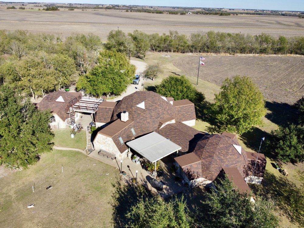 Slide of Bobcat Roofing