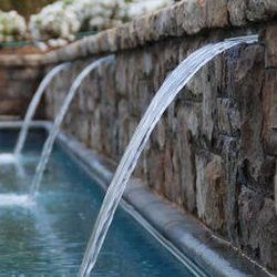 Stevenson Pools - Gunite Pool with Natural Rock Waterfall Feature