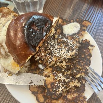 Breakfast by Salt’s Cure - The signature pancakes with half egg and sausage sandwich - Breakfast & Brunch Near Me - Brooklyn, New York
