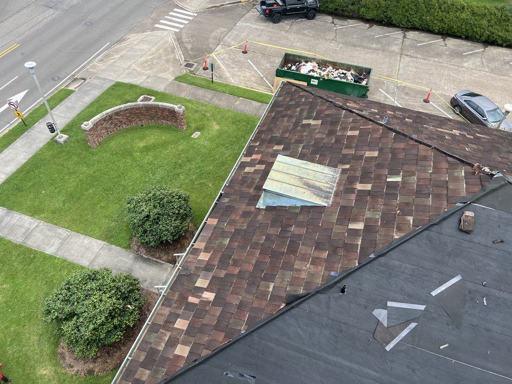 Slide of Caballeros Roofing