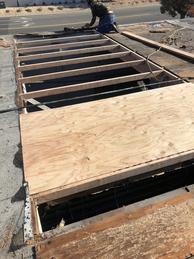 Slide of New Era Roofing