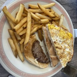 Skilletz - The world's smallest hamburger patty, overcooked egg, and cheese on a somewhat stale Kaiser roll.