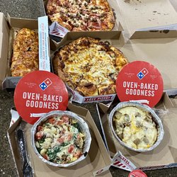 Domino's Pizza - Dinner is ready!!!   Memphis BBQ pizza, Meatzza, Pasta Primavera, (BYO) Sausage, chicken Alfredo pasta & Stuffed Spinach/Feta bread.