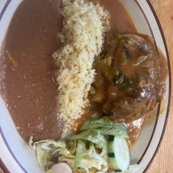 Chile Relleno with salad, rice and refried beans