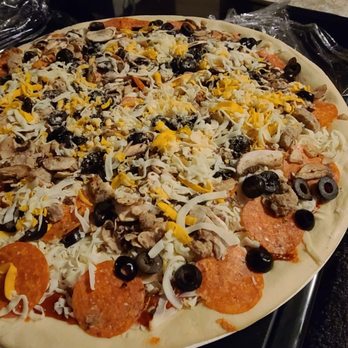 Papa Murphy's - a pizza with cheese and olives - Pizza Near Me - Fuquay Varina, North Carolina Papa Murphy's - a pizza with cheese and olives - Pizza Near Me - Fuquay Varina, North Carolina