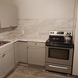 Abound Installation - New Kitchen flooring, cabinets, tile back splash, and counter top