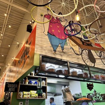 Chaat Mandi - a bicycle hanging from the ceiling - Indian Near Me - Morrisville, North Carolina Chaat Mandi - a bicycle hanging from the ceiling - Indian Near Me - Morrisville, North Carolina
