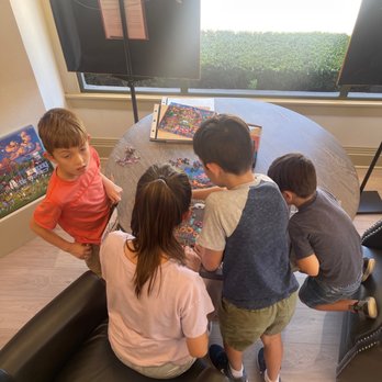 Dowdle Gallery - Kids having fundoing puzzles. - Art Galleries Near Me - Solvang, California