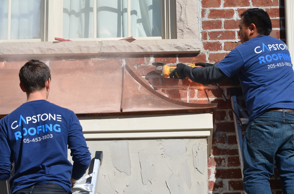 Slide of Capstone Roofing