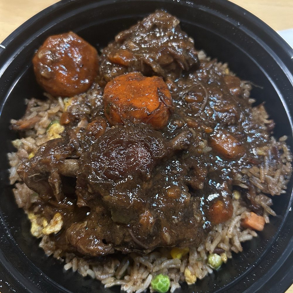 Traphouse Caribbean - Oxtail fried rice . It was seasoned so well. Definitely going back. - Caribbean Near Me - Austin, Texas Traphouse Caribbean - Oxtail fried rice . It was seasoned so well. Definitely going back. - Caribbean Near Me - Austin, Texas