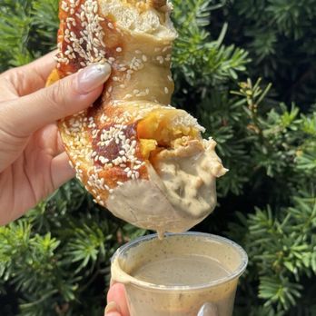 Moonrise Bagels  - sausage egg and cheese stuffed bagel with mooney sauce - Bagels Near Me - New York, New York