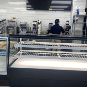 GuateBakery - a woman behind the counter - Bakeries Near Me - Gaithersburg, Maryland