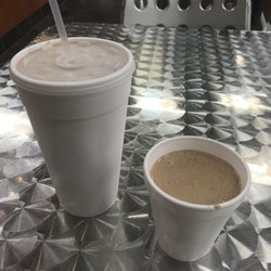 They give you the extra's in a smaller separate cup :)