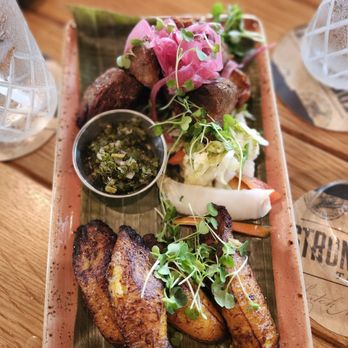 Strong Water Tavern - Griot- nice crust on the pork, but slightly dry. Plantains were caramelized goodness - Caribbean Near Me - Orlando, Florida