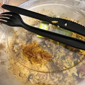 Nando's Peri-Peri - One of the stuck on rice balls - Chicken Shop Near Me - OakPark, Illinois
