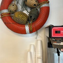 Seafood Shack Market and Deli - Just a cute lifesaver and fishing net with coffee.
