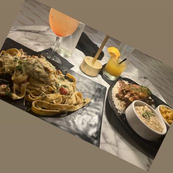 Fin & Feathers Stone Mountain - Nostalgia Turkey Wings and Crab Cake Pasta - Lounges Near Me - Stone Mountain, Georgia Fin & Feathers Stone Mountain - Nostalgia Turkey Wings and Crab Cake Pasta - Lounges Near Me - Stone Mountain, Georgia